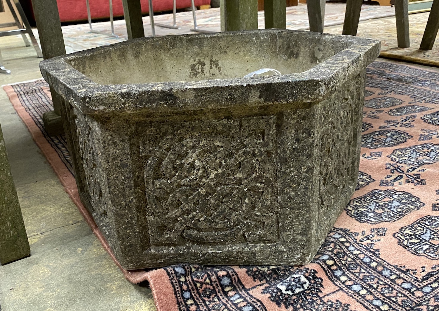A hexagonal cast stone garden planter, width 47cm, height 26cm
